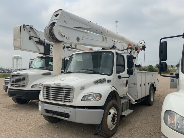 Two white trucks  