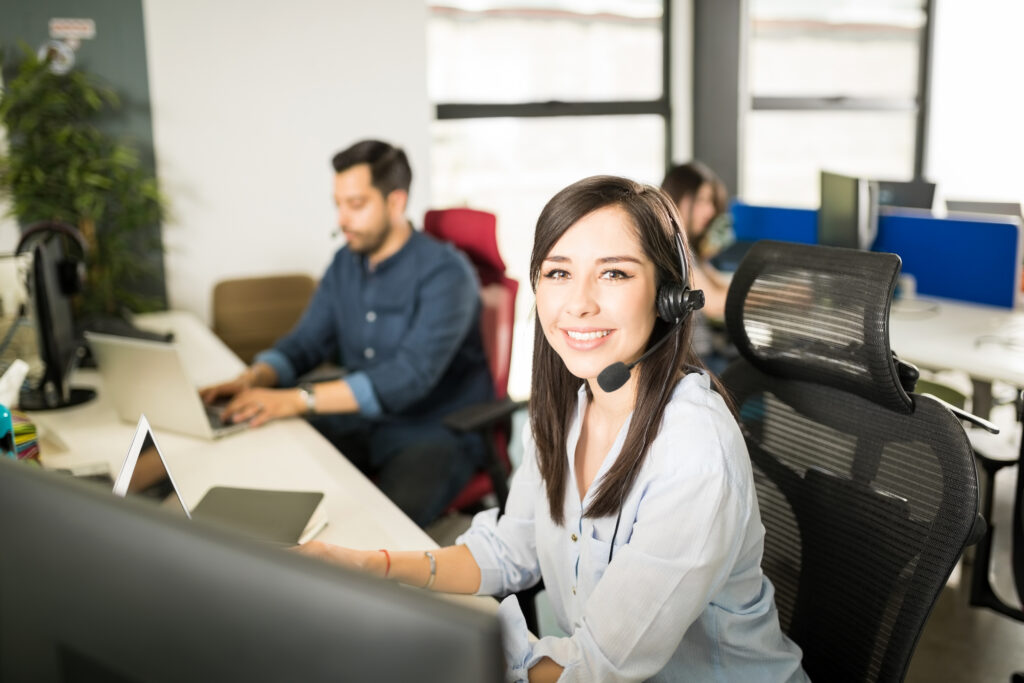 A woman wearing a headset